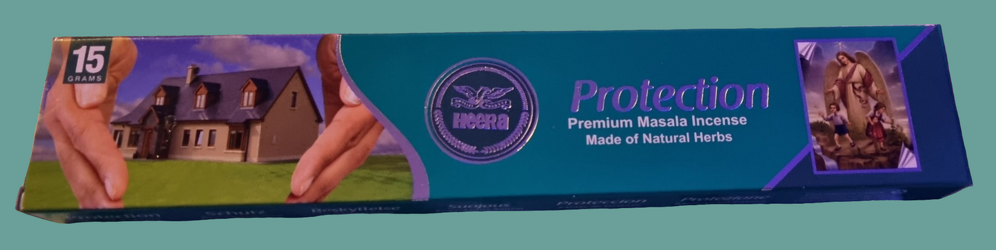 Close-up of burning Heera Protection incense sticks with smoke