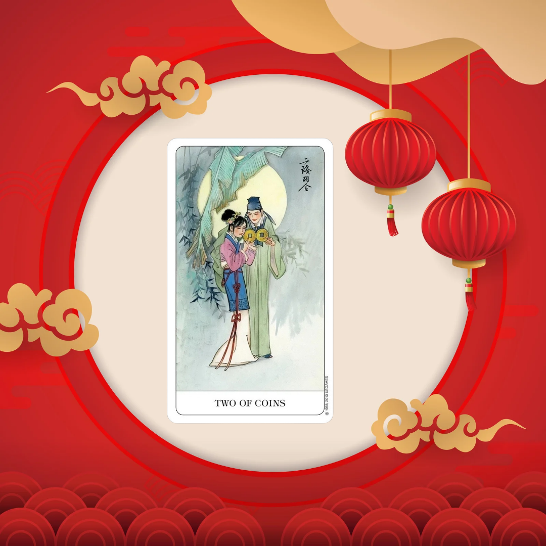 Hand Holding a Card from the Chinese Tarot Deck