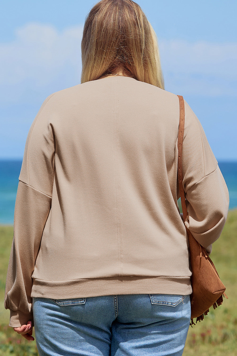 A pale khaki plus-size sweatshirt featuring a floral peace sign graphic and a Washed Terry Finish - ALOE WINGS STORE