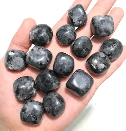 Protective black obsidian tumbled stones for shielding and grounding