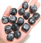 Protective black obsidian tumbled stones for shielding and grounding