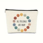 Canvas pouch with smiley face illustrations and 'All feelings are okay' text on a white background