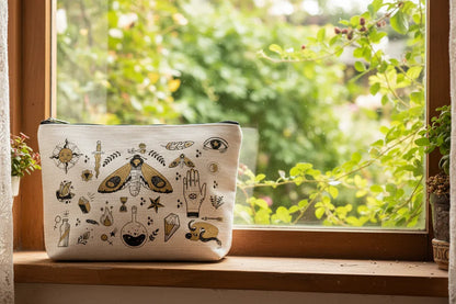 Aesthetic beige makeup bag featuring a moth, moon phases, and mystical occult symbols.