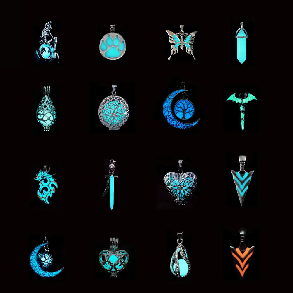 Collection of various glowing pendants on a black background