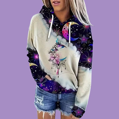 Person wearing a hoodie with a colorful design on a purple background