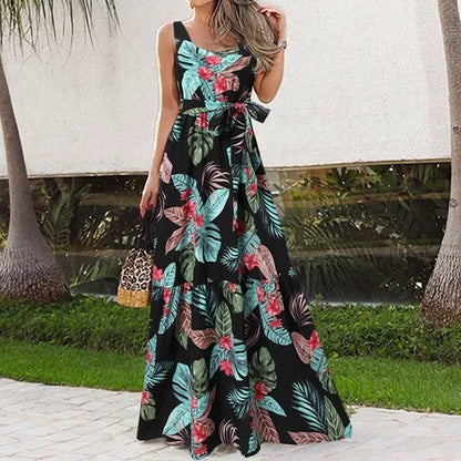 Dark green tropical leaf print bohemian maxi dress for summer.