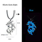 Dragon-shaped pendant necklace in antique silver and blue on a black background