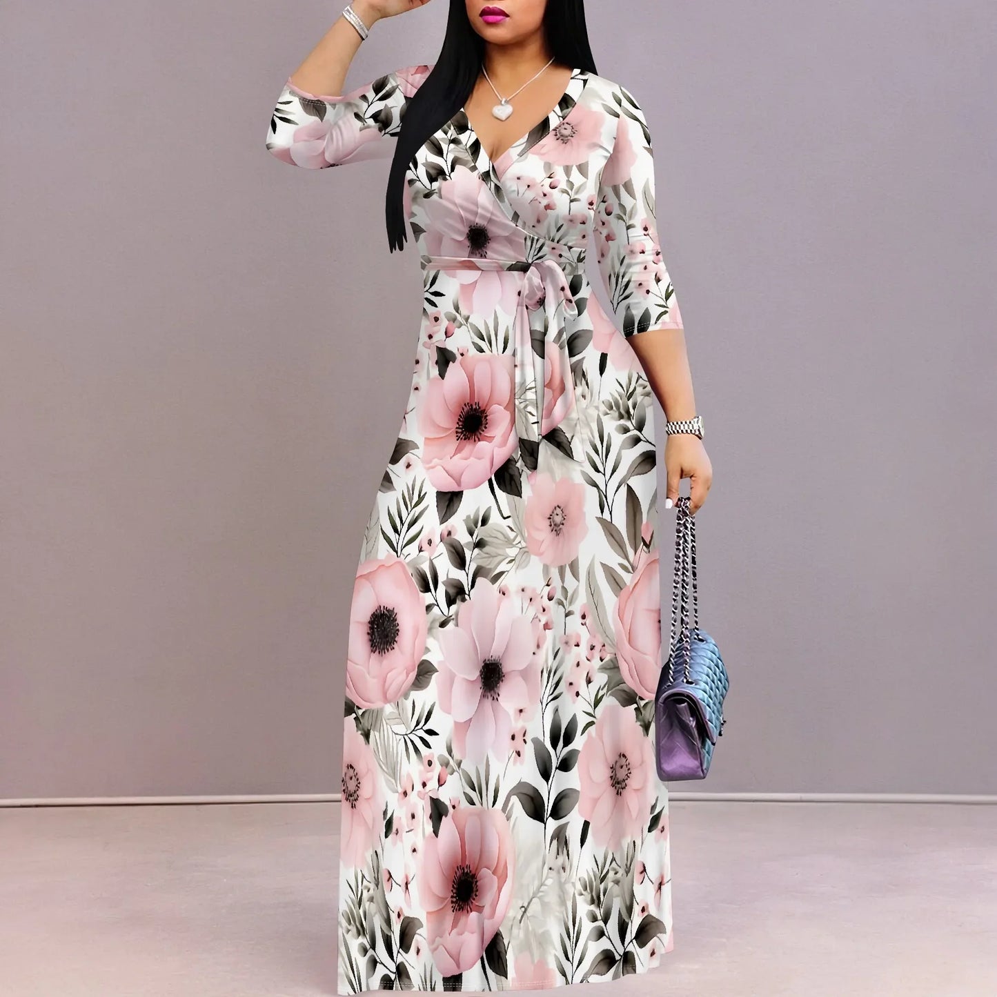 Woman wearing a floral dress with a gray background