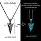 Glowing arrowhead pendant with chain, showing dimensions and light absorption instructions.