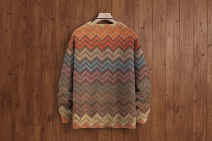 Multicolored zigzag pattern sweater on a wooden background