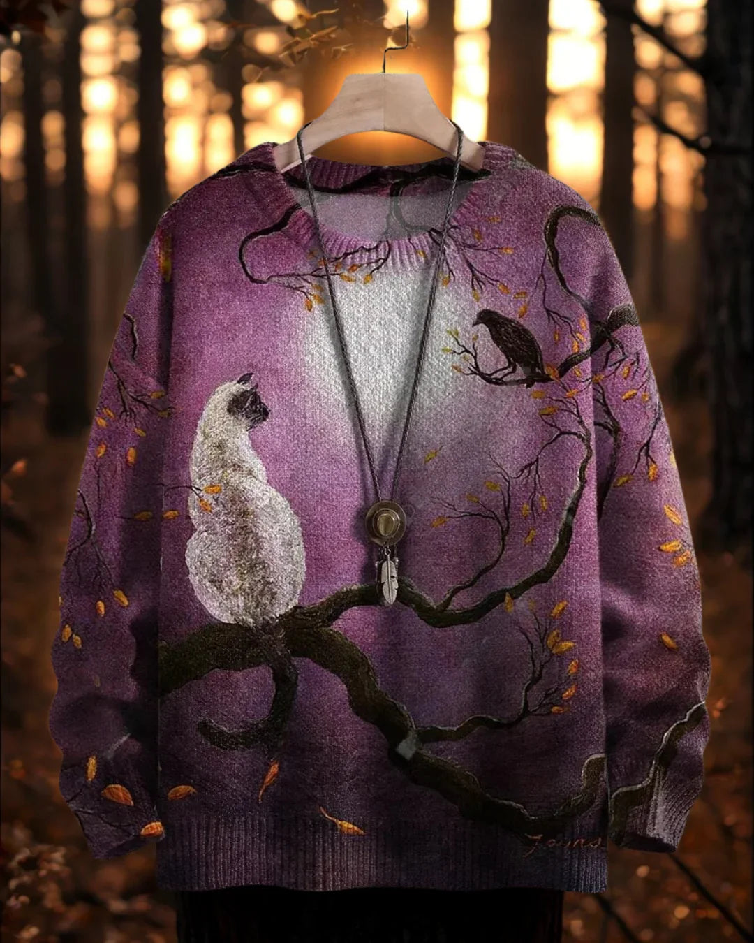 White owl and black cat on a tree branch against a purple twilight sky on a 3D sweater.