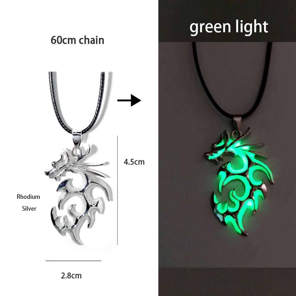 Dragon-shaped necklace with rhodium silver and green light options on a white background.