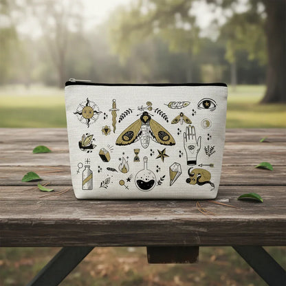 Pouch with black and gold illustrations on a white background