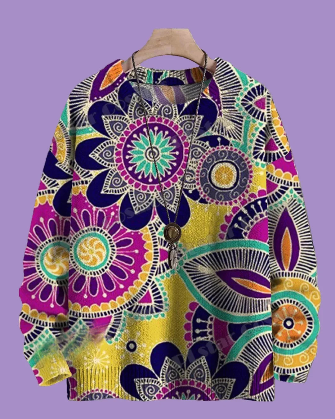 Colorful patterned sweater on a hanger against a purple background