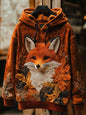 Fox face print hoodie in orange and brown tones — autumn-themed, cosy, and trendy