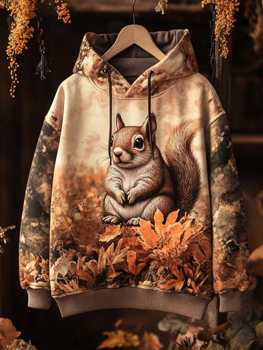 Squirrel hoodie with fall foliage — cosy, fun, and perfect for animal lovers