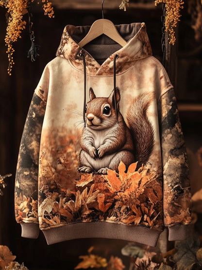 Squirrel hoodie with fall foliage — cosy, fun, and perfect for animal lovers