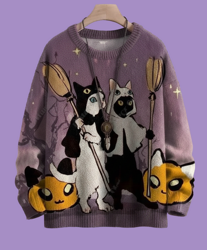 Playful purple sweater showing three cartoon cats with brooms and pumpkin lanterns against a starry night sky