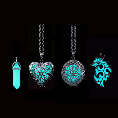 Set of four glowing necklaces on a black background