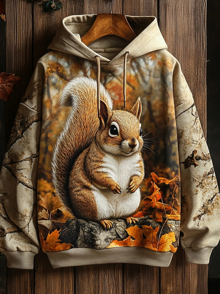 Hoodie with realistic squirrel print sitting on a tree branch surrounded by autumn leaves — soft polyester, oversized fit