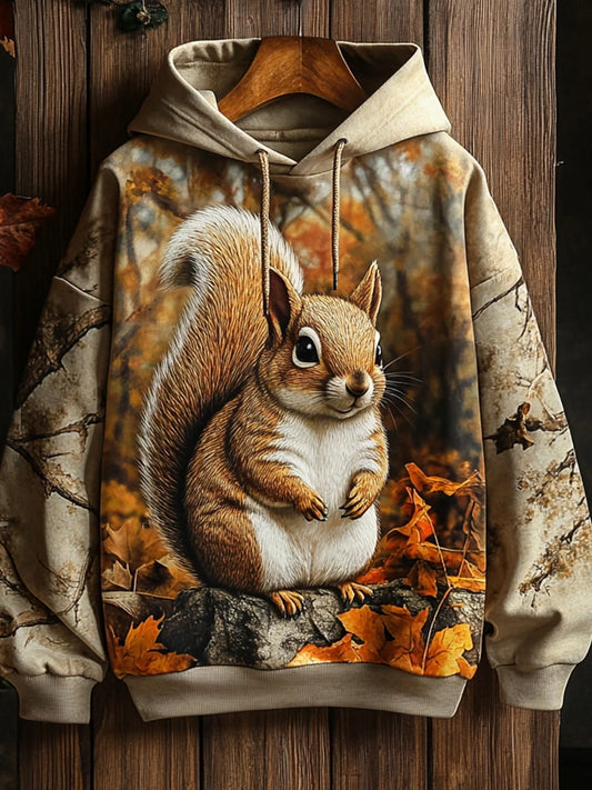 Hoodie with realistic squirrel print sitting on a tree branch surrounded by autumn leaves — soft polyester, oversized fit