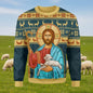 Sweater with religious design of a figure holding a lamb and deer pattern on a blue background