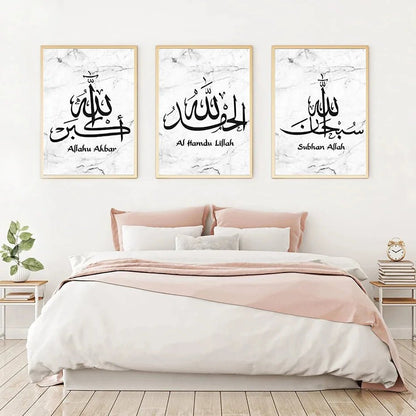 Serene bedroom decor with three Islamic calligraphy wall art pieces — "Allahu Akbar," "Alhamdulillah," and "Subhan Allah" — above a pink-accented bed