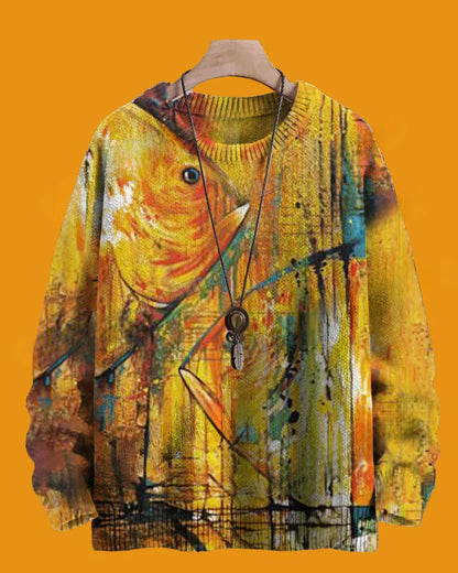 Colorful sweater with abstract design on a hanger against an orange background