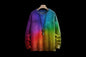 Colorful sweater with a gradient effect on a black background