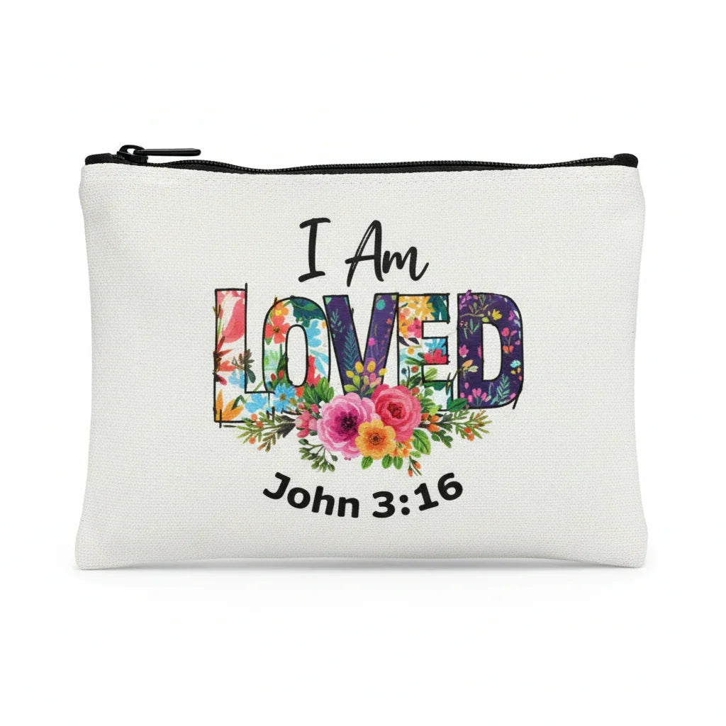 White pouch with 'I Am Loved' text and floral design on a white background