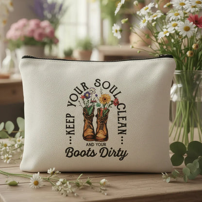 White pouch with 'Keep your soul clean and your boots dirty' text and boot design on a white background