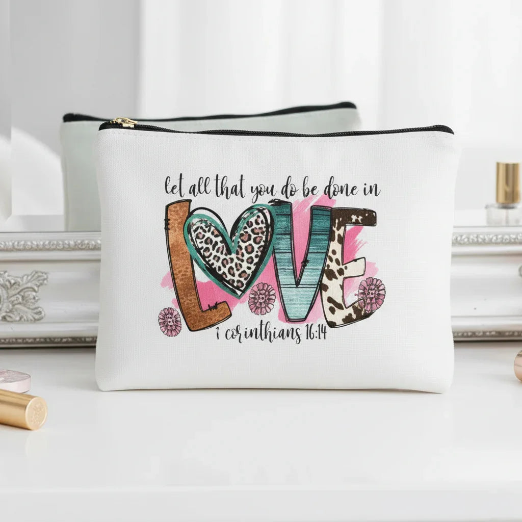 White pouch with colourful 'love' design and text on a white background