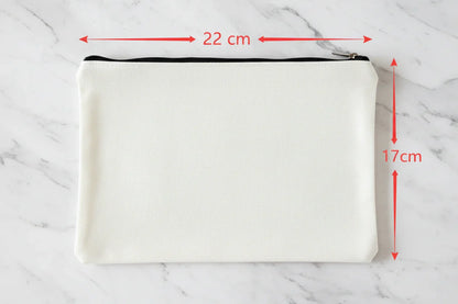 White pouch with measurements marked in red on a dark background