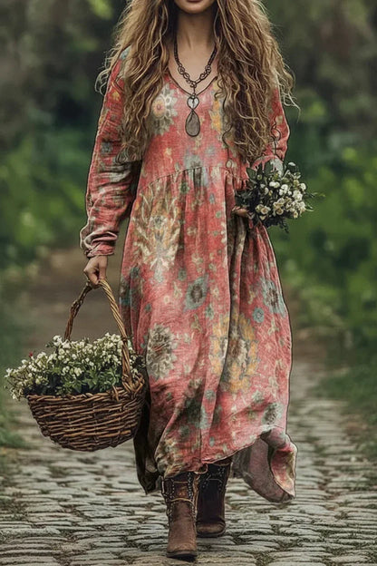 Woman in a floral dress holding a basket and flowers in a natural setting