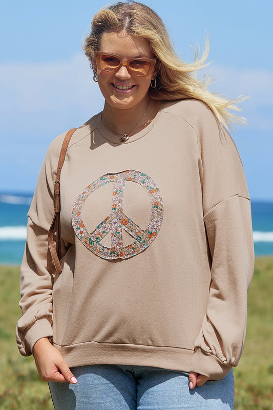 A pale khaki plus-size sweatshirt featuring a floral peace sign graphic and a Washed Terry Finish - ALOE WINGS STORE