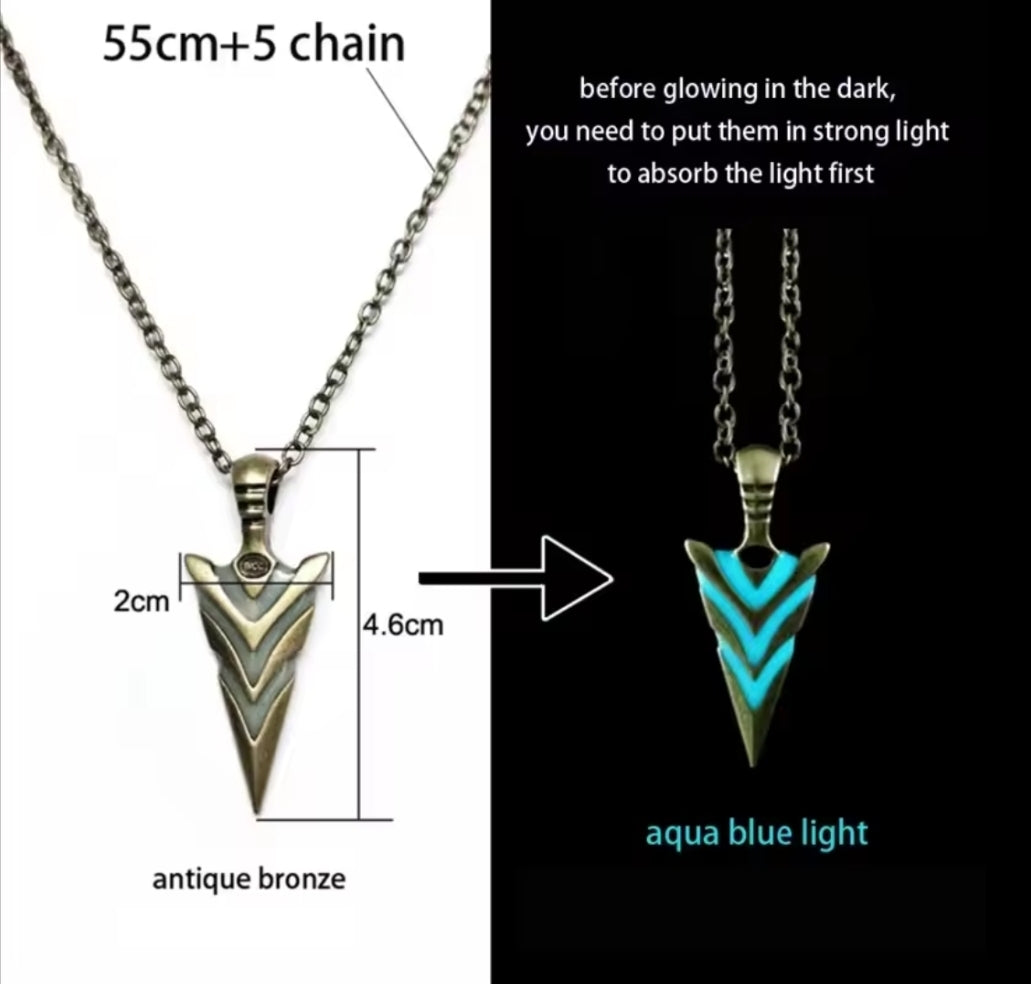 Necklace with arrowhead pendant showing measurements and glow-in-the-dark feature.