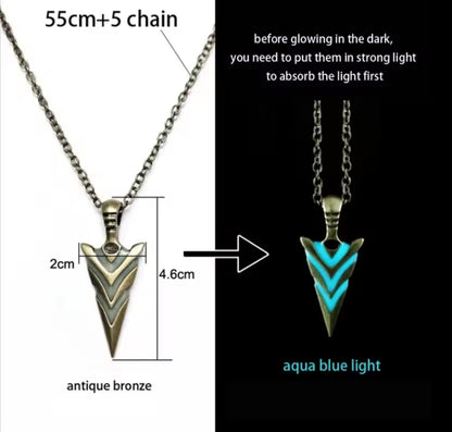 Necklace with arrowhead pendant showing measurements and glow-in-the-dark feature.