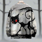Abstract black and white graphic sweater featuring a stylized spooky black cat in a swirling, monochrome art style.