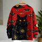 Striking red and black gothic-style sweater featuring a black cat surrounded by a pattern of glowing yellow eyes