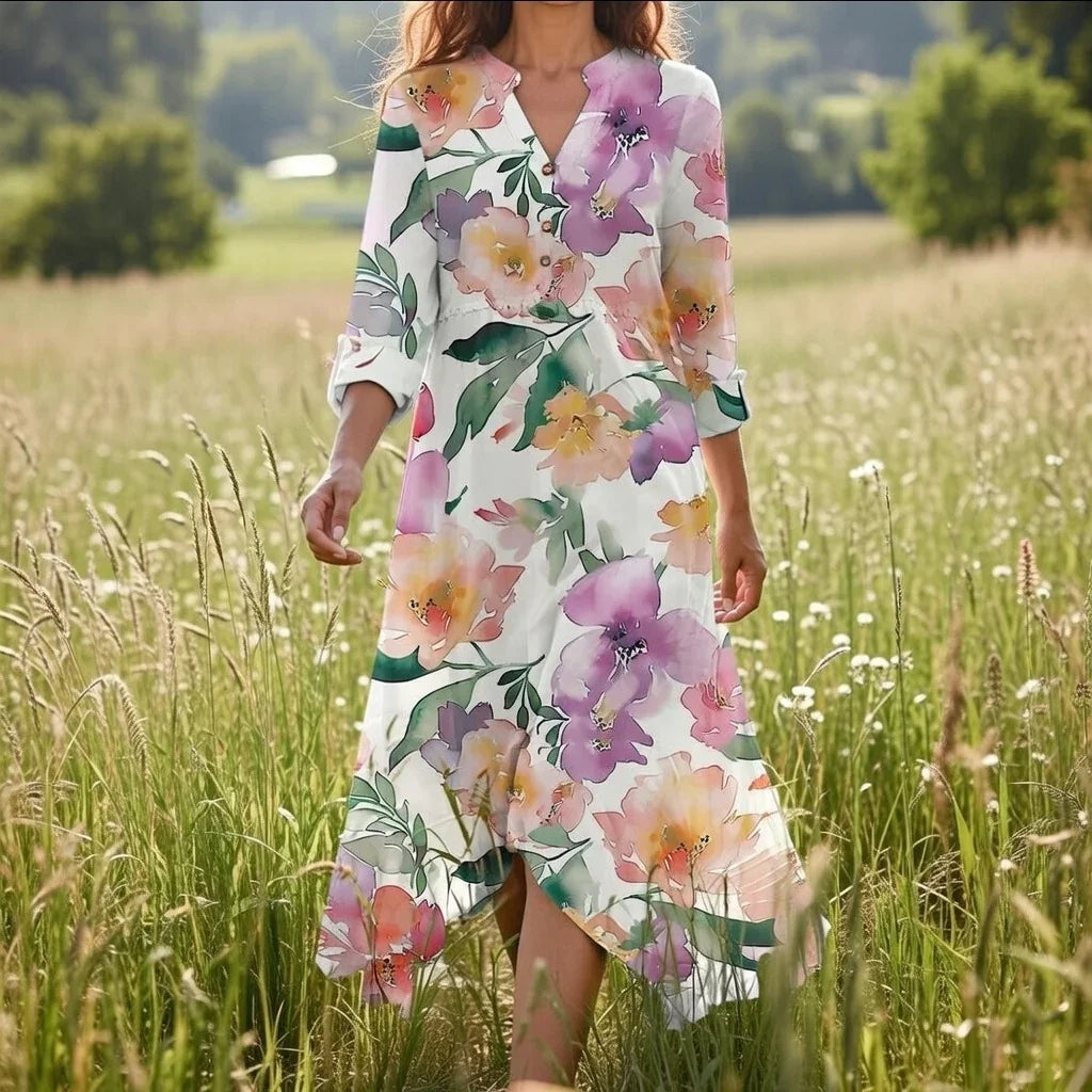 Side profile of floral maxi dress: V-neckline, flowing ankle skirt, full sleeves — highlighting drape and fit.