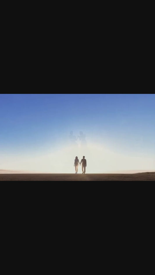 Preview of the HD karaoke video featuring a silhouette of a couple walking toward a bright celestial light.