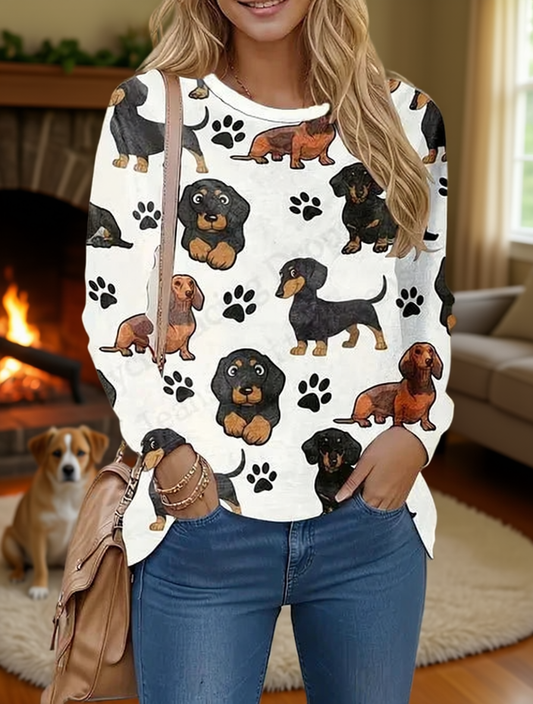 Woman wearing cute cat 3D print long sleeve t-shirt with dachshund and paw prints on white background