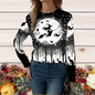 Black sweatshirt with orange pumpkins and leafy patterns – autumn-inspired Halloween design.