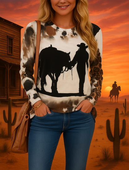 Western cowboys and bull silhouette on women's rustic animal print sweater