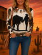 Western cowboys and bull silhouette on women's rustic animal print sweater